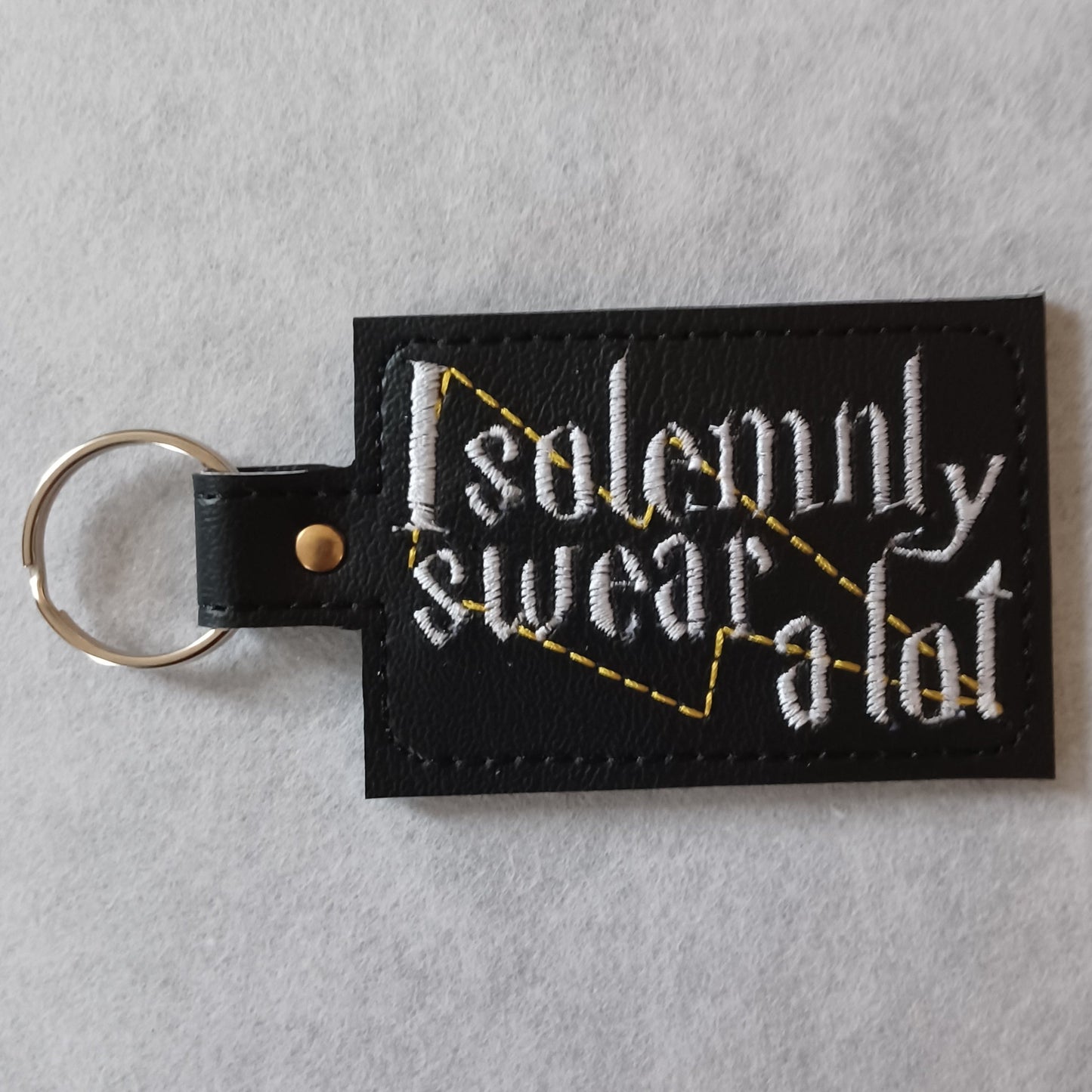 Magic School "...Swear a Lot" Embroidered Vinyl Key Ring