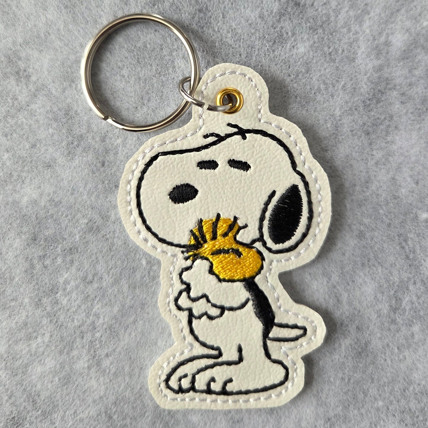 CB Dog & Bird Hug Embroidered Vinyl Key Ring