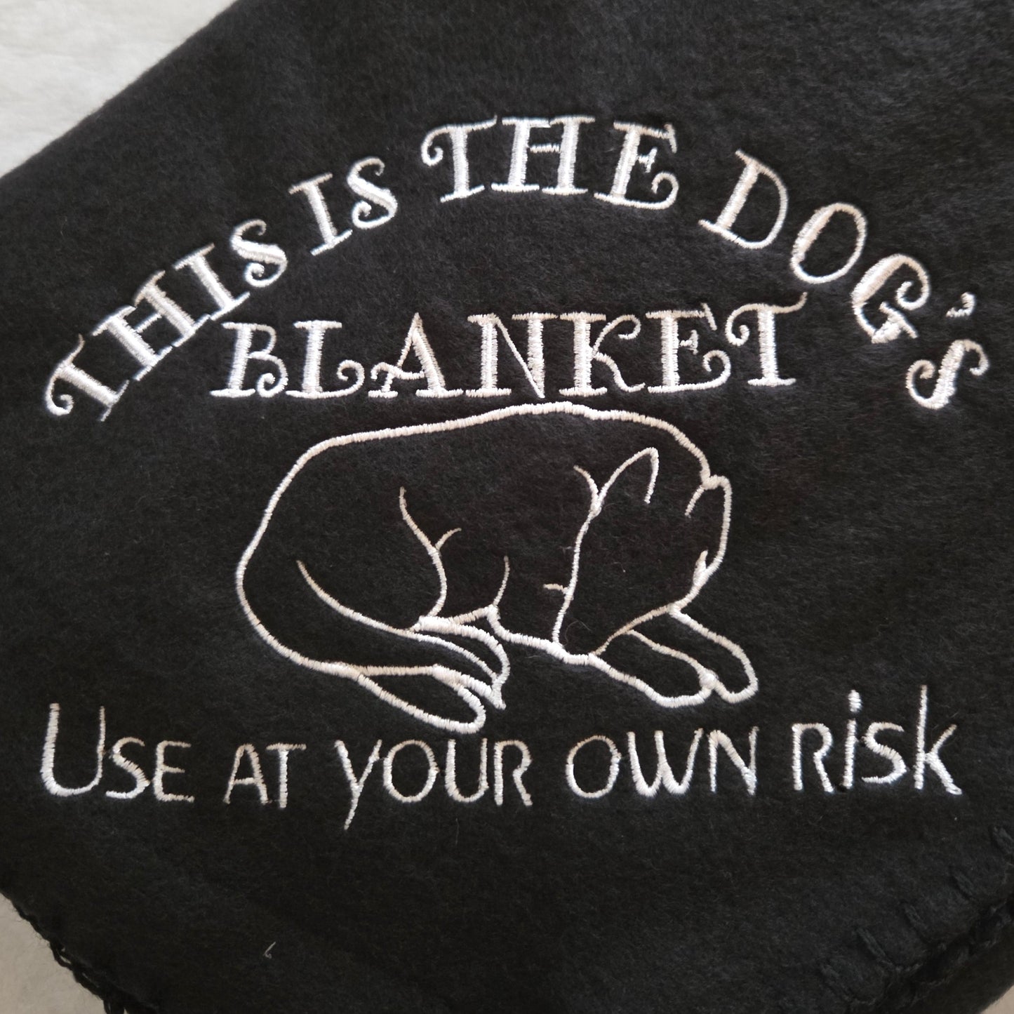"This is the Dog's Blanket. Use at Your Own Risk" Fleece Throw Blanket