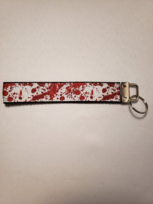 Blood Spatter on White Key Fob