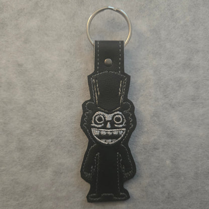 Basement Monster Embroidered Vinyl Key Ring