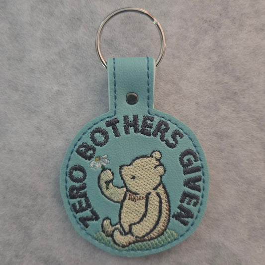 Zero Bothers Given Embroidered Vinyl Key Ring