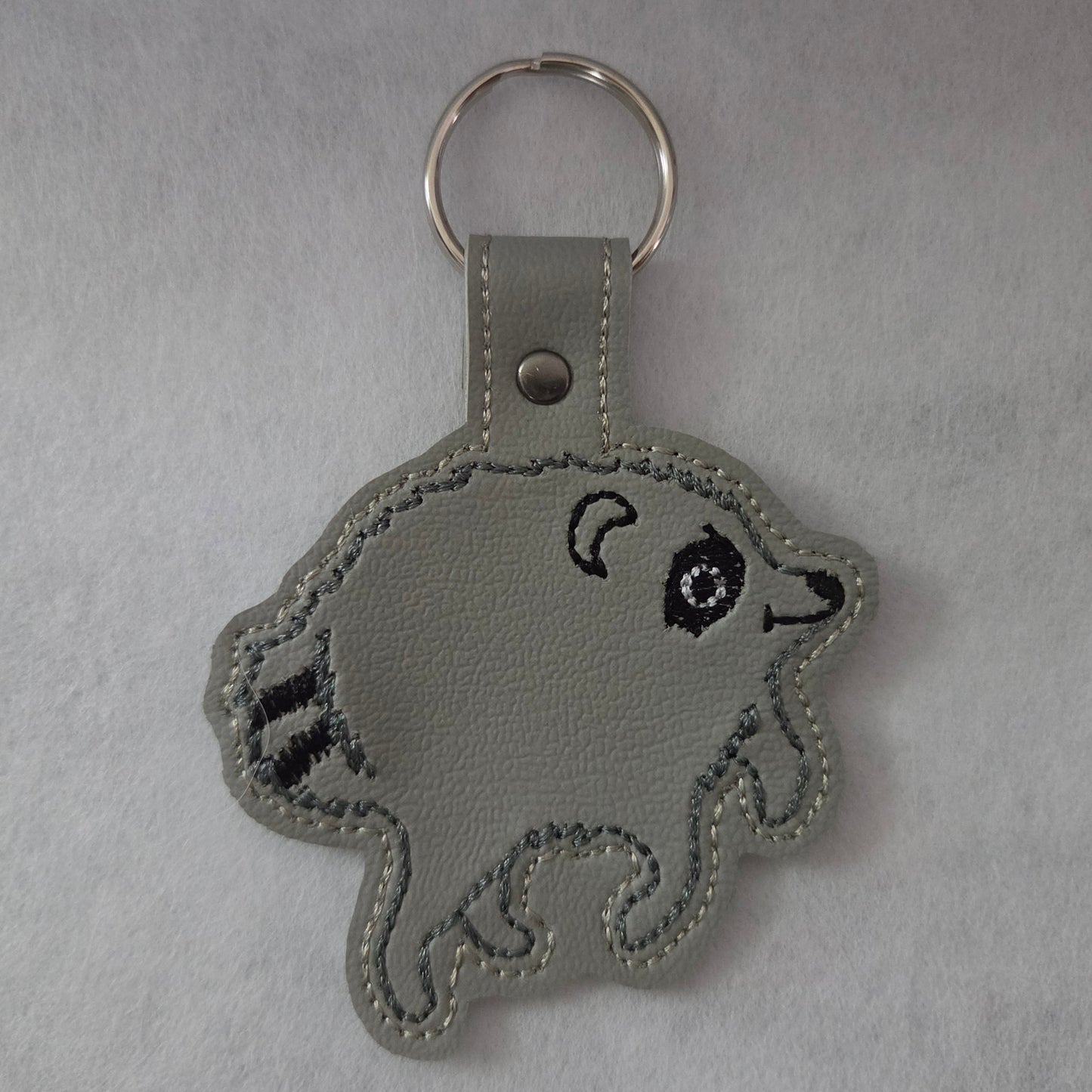 Jimothy Raccoon Embroidered Vinyl Key Ring