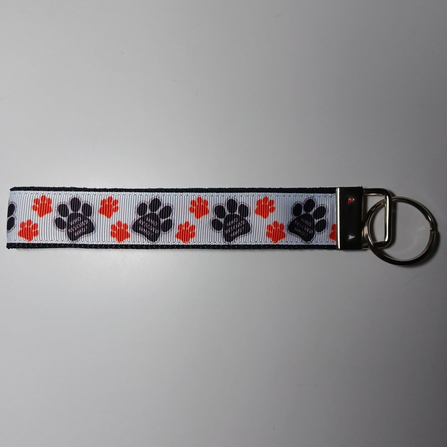 "Who Rescued Who?" Pawprints Key Fob